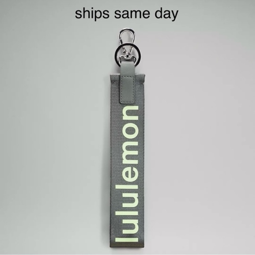 Lululemon never lost keychain grey sage faded zap NWT